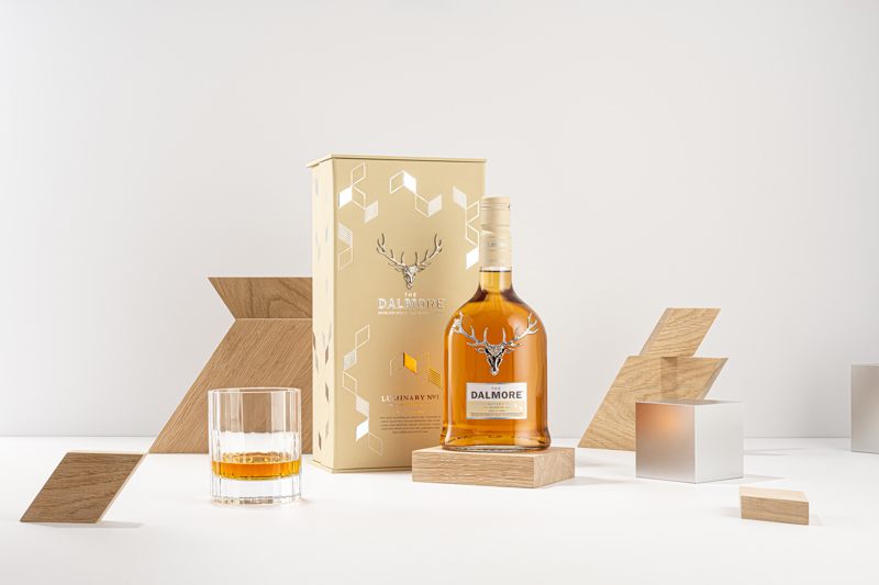 Bottle, glass, box and various pieces of sculpted wood and metal
