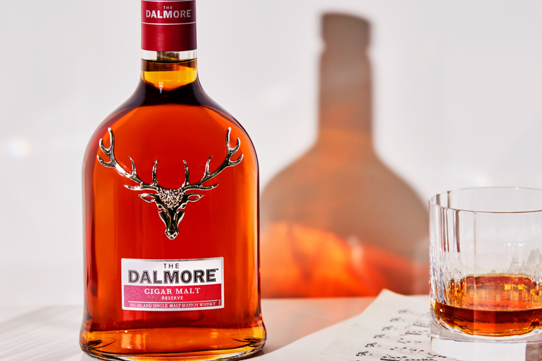 Bottle, glass and sheet music